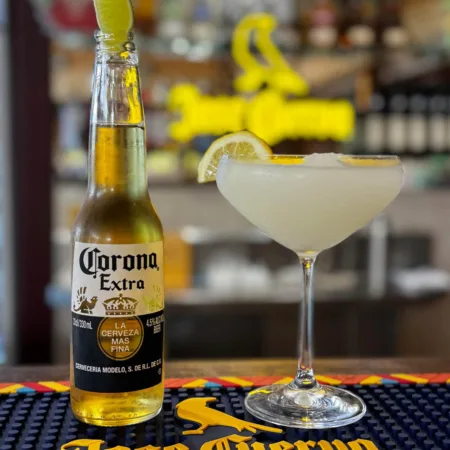 Cold beer and frozen margarita on the bar, at The Mad Mexican Batemans Bay.