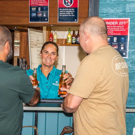 Guests enjoying a drink at Batemans Bay Indoor Golf Bar & Lounge