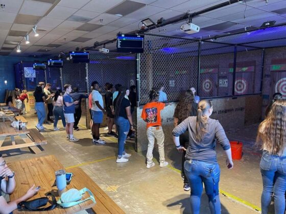 People doing axe throw. Image Credit: The Axe N Dagger